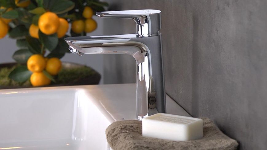 Змішувач для раковини із середнім виливом і зливним гарнітуром HANSGROHE TALIS E 71710340, чорний матовий хром 76278 фото